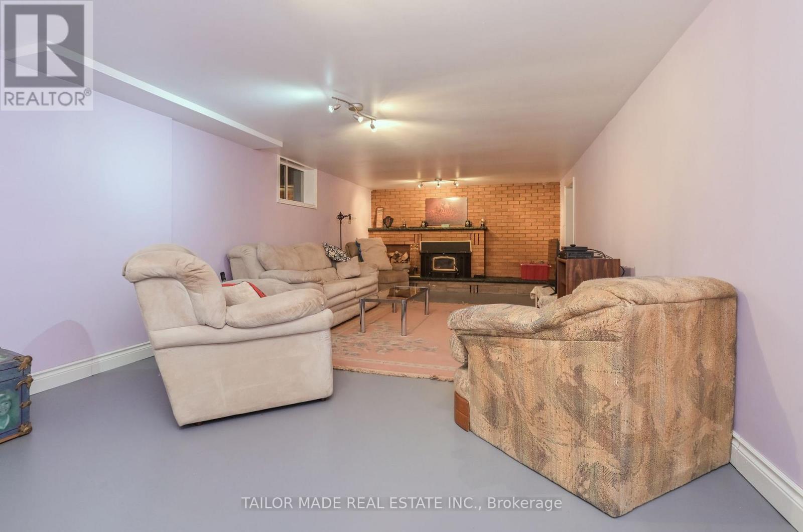 171 Murphy Road, Essa, ON - Indoor Photo Showing Living Room With Fireplace