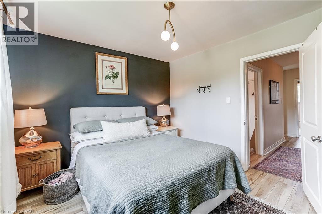 Wood-finish flooring throughout - 2488 Brookhurst Road, Mississauga, ON - Indoor Photo Showing Bedroom