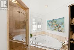 Primary Ensuite 4-Pc Bathroom W Tub&Glass Shower - 