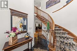 Front Foyer W Lg W/I Closet&Elegant Oak Staircase - 