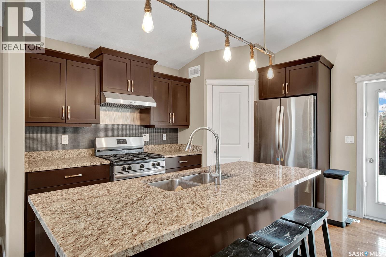 1103 Muzyka Road, Saskatoon, SK - Indoor Photo Showing Kitchen With Double Sink With Upgraded Kitchen