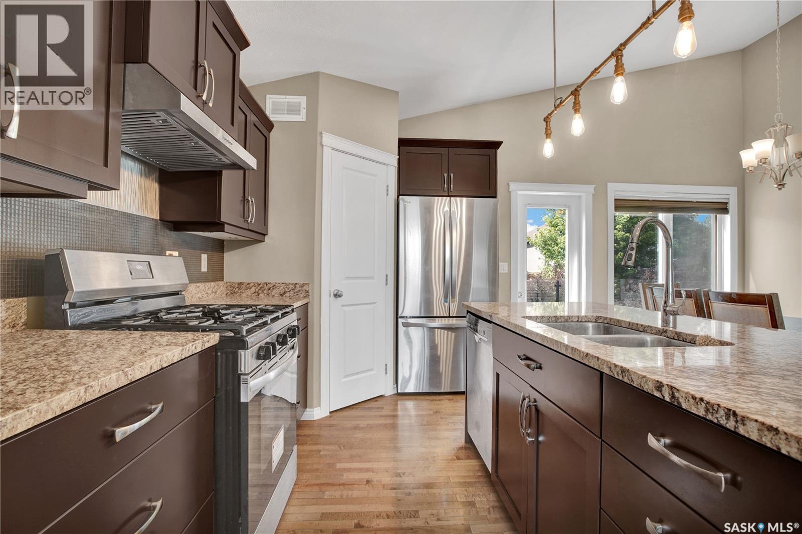 1103 Muzyka Road, Saskatoon, SK - Indoor Photo Showing Kitchen With Double Sink With Upgraded Kitchen