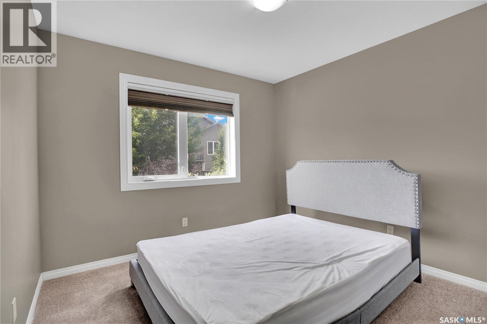 1103 Muzyka Road, Saskatoon, SK - Indoor Photo Showing Bedroom