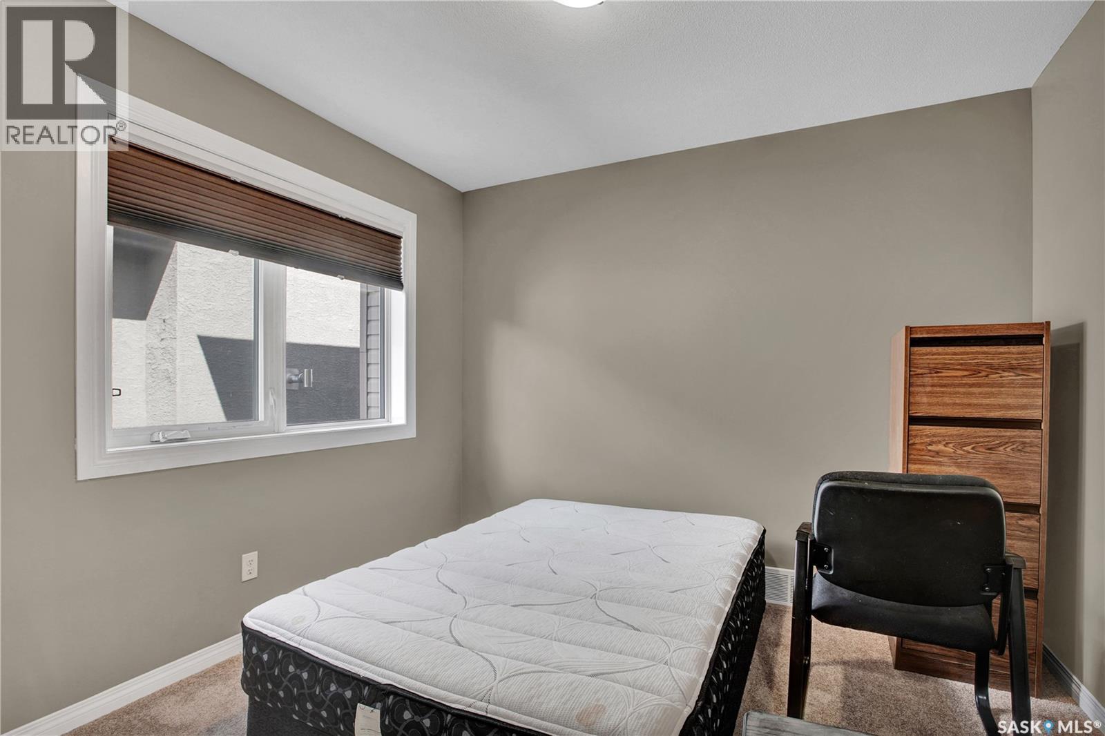 1103 Muzyka Road, Saskatoon, SK - Indoor Photo Showing Bedroom