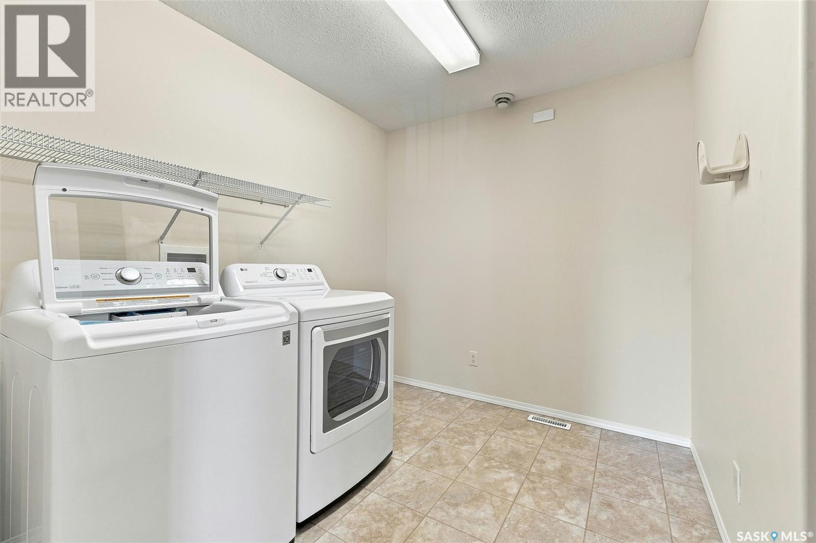 304 6 Lorne Place, Regina, SK - Indoor Photo Showing Laundry Room