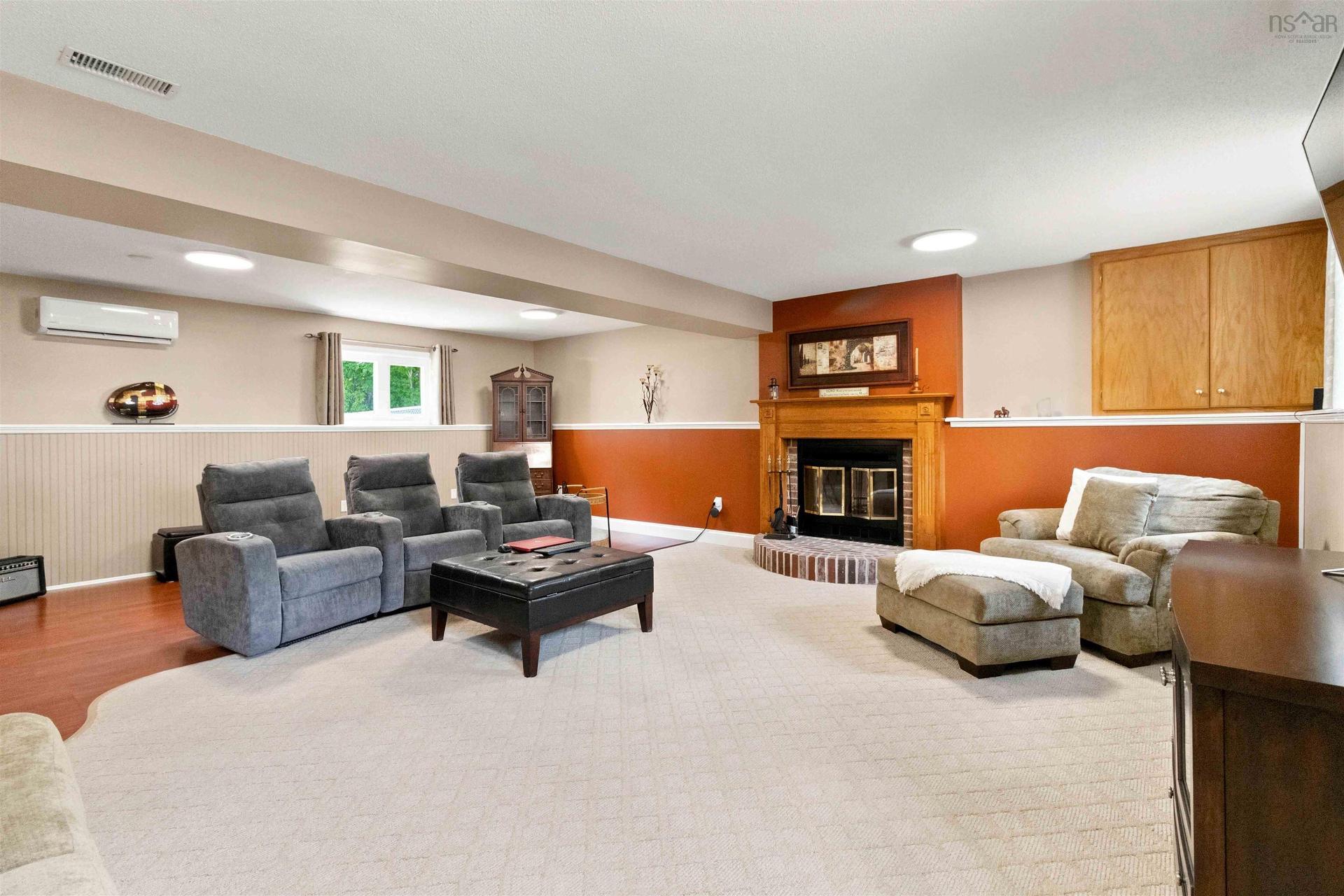 18 P Thomas Drive, Dartmouth, NS - Indoor Photo Showing Basement With Fireplace