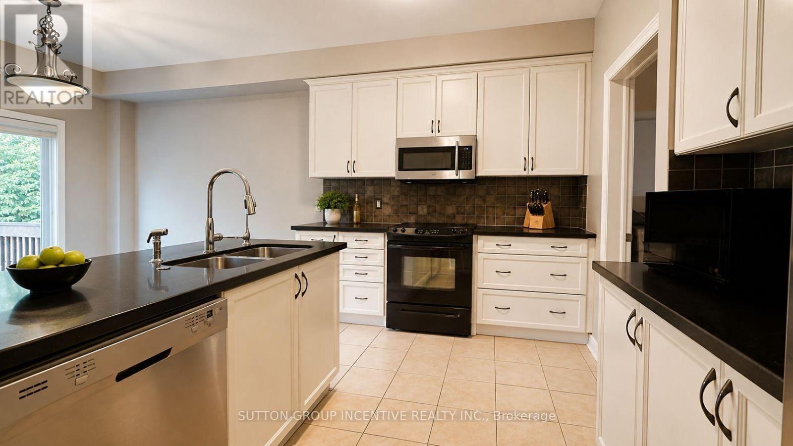 48 Riverwalk Place, Midland, ON - Indoor Photo Showing Kitchen With Double Sink