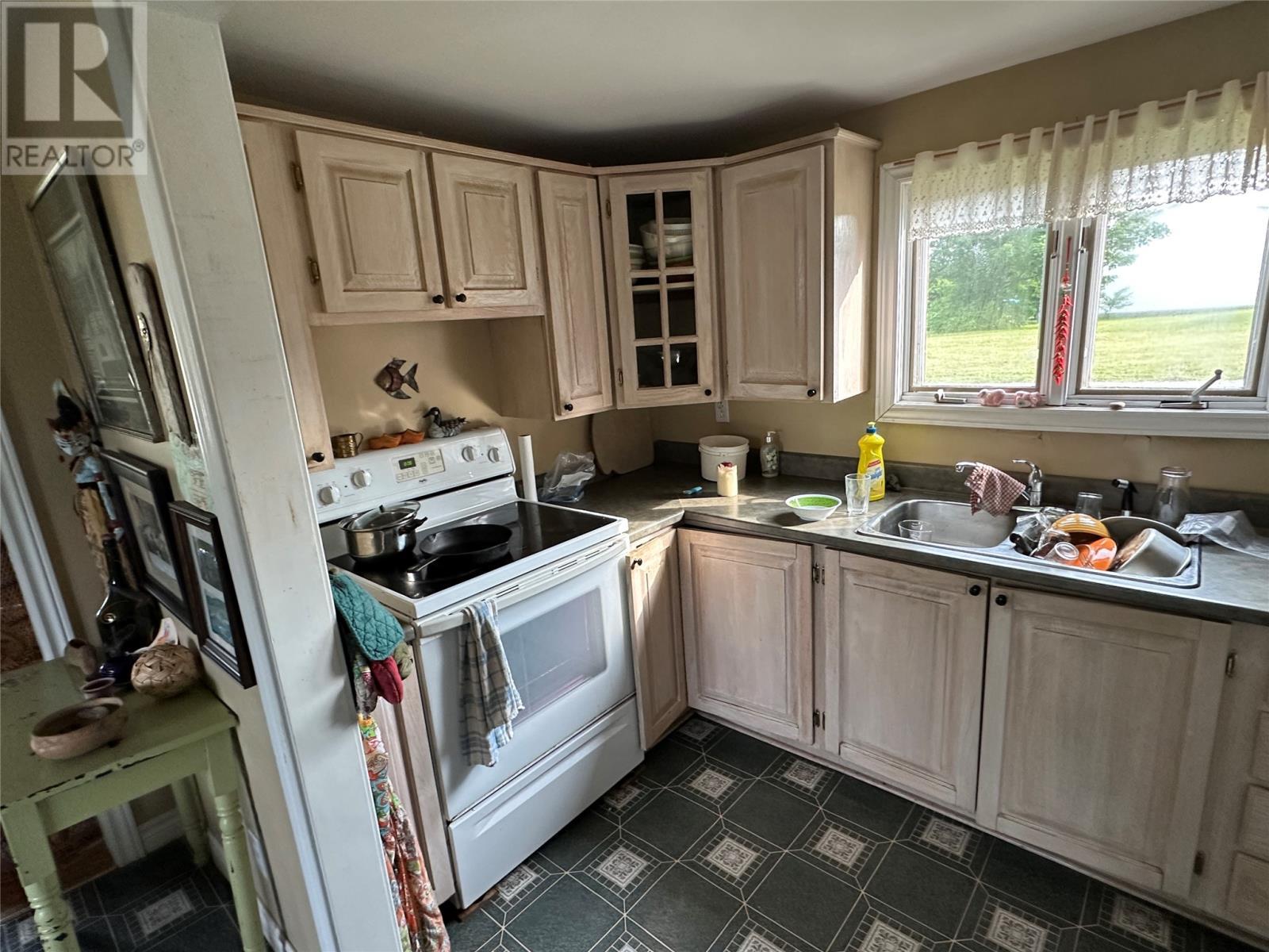 32 Marsh Road, Hants Harbour, NL - Indoor Photo Showing Kitchen With Double Sink