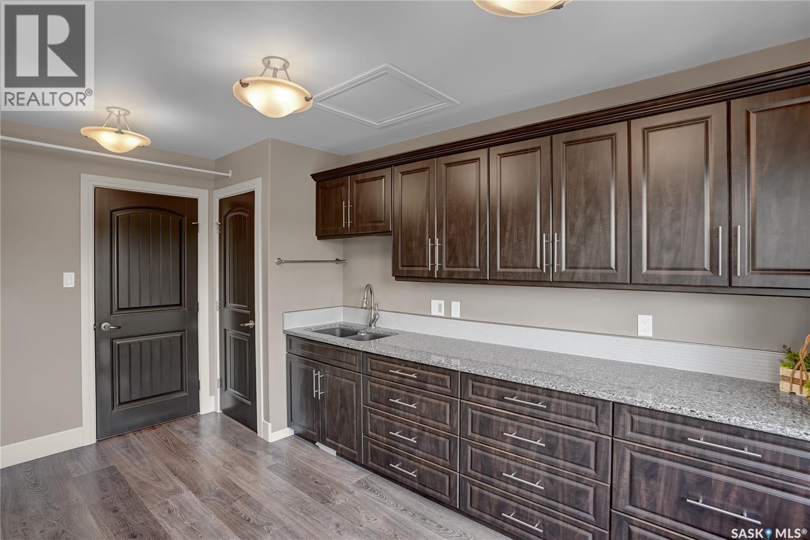 507 Tatanka Drive, Buffalo Pound Lake, SK - Indoor Photo Showing Kitchen With Double Sink