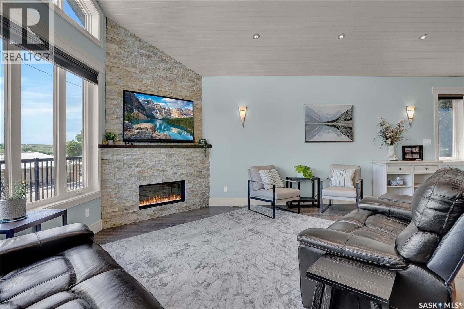 507 Tatanka Drive, Buffalo Pound Lake, SK - Indoor Photo Showing Living Room With Fireplace