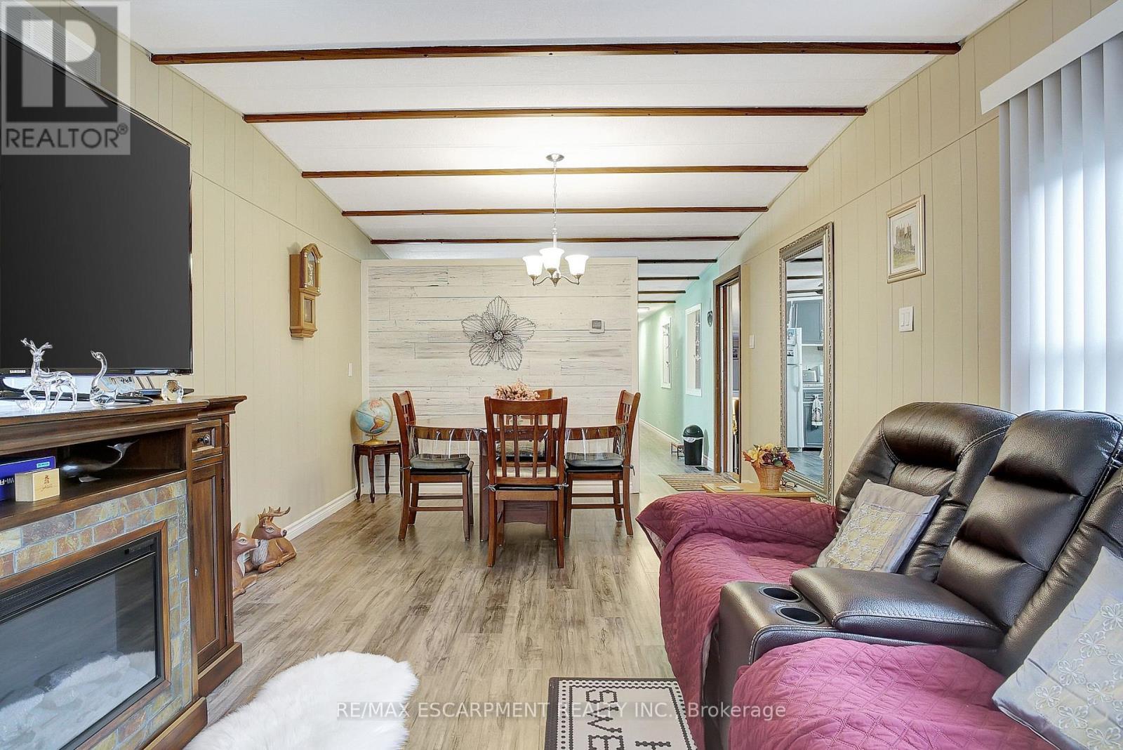 1A - 1429 Sheffield Road, Hamilton, ON - Indoor Photo Showing Living Room With Fireplace