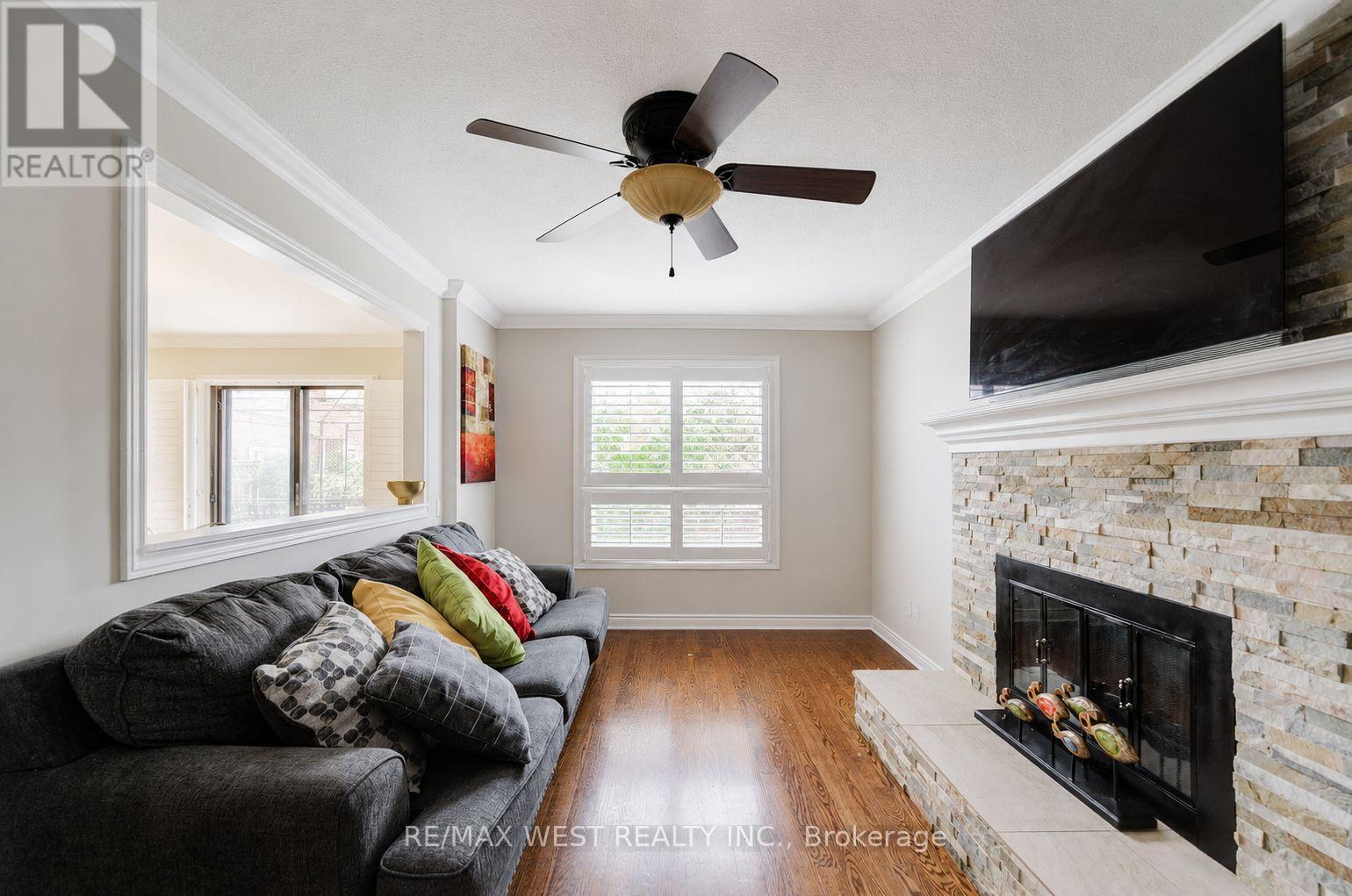 8 Ballycastle Crescent, Brampton, ON - Indoor Photo Showing Living Room With Fireplace