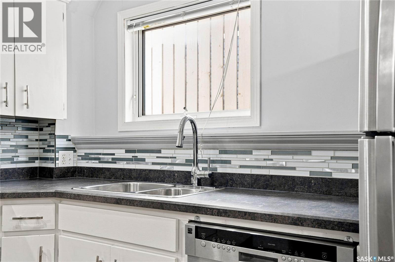 205 Imperial Street, Saskatoon, SK - Indoor Photo Showing Kitchen With Double Sink