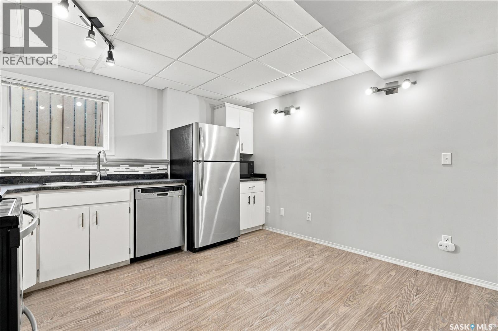 205 Imperial Street, Saskatoon, SK - Indoor Photo Showing Kitchen With Stainless Steel Kitchen With Double Sink