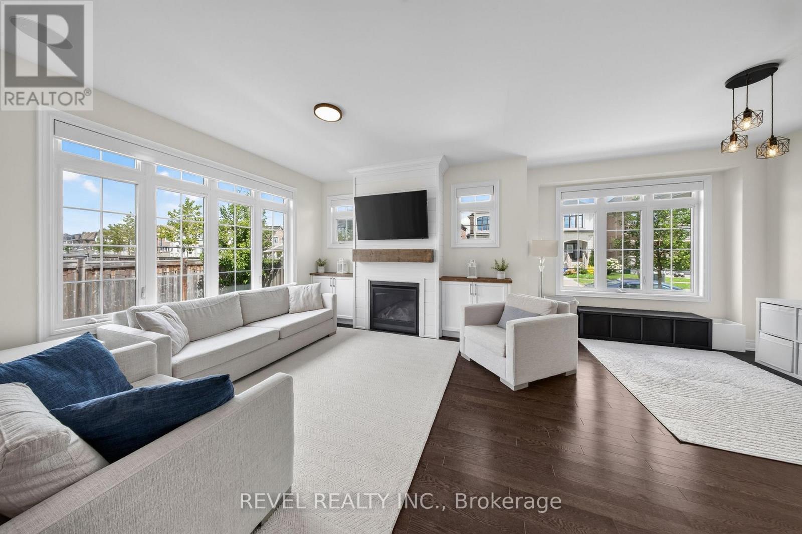 455 Ramsey Place, Milton, ON - Indoor Photo Showing Living Room With Fireplace