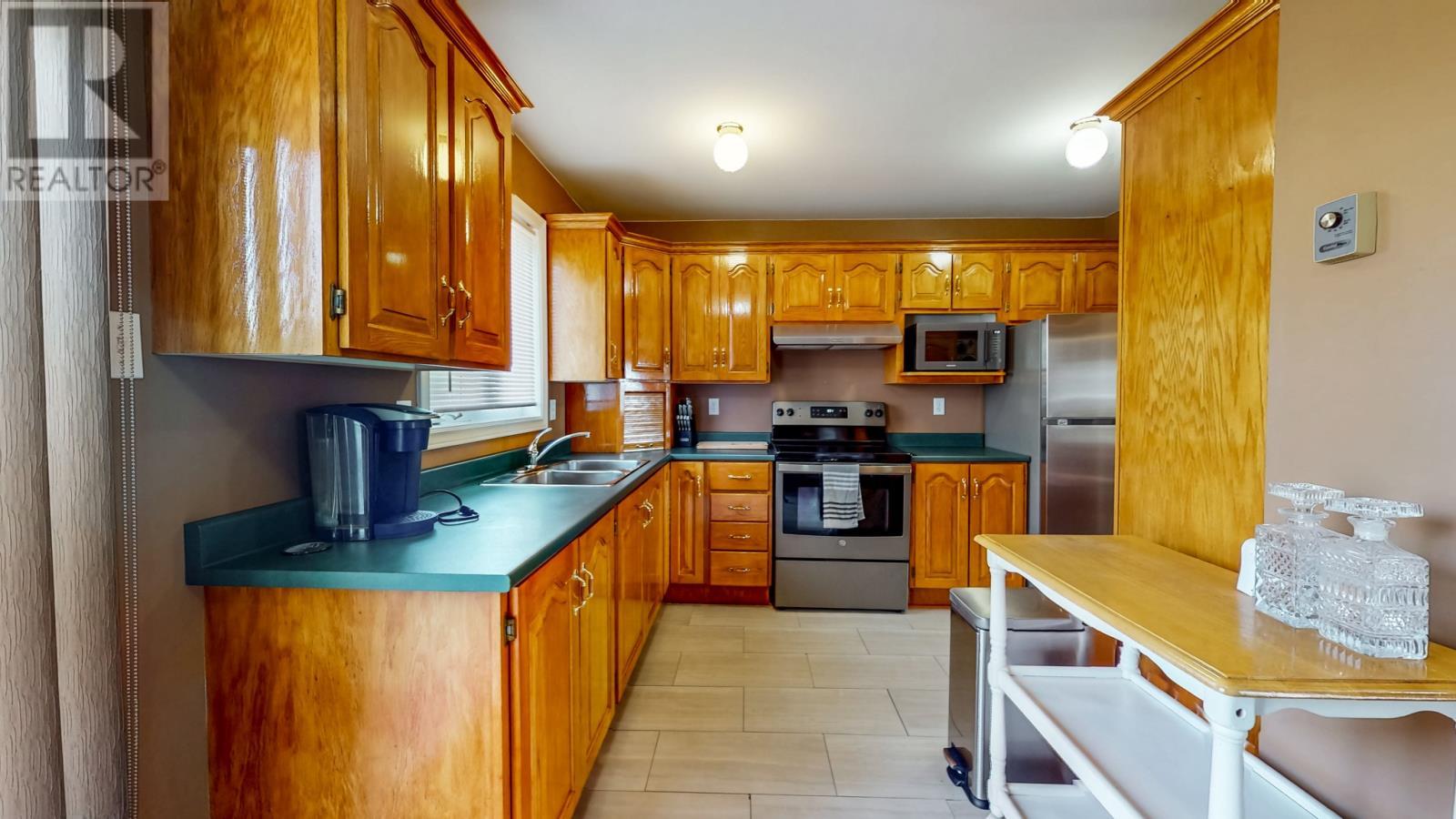 1 Hector Place, Paradise, NL - Indoor Photo Showing Kitchen With Double Sink