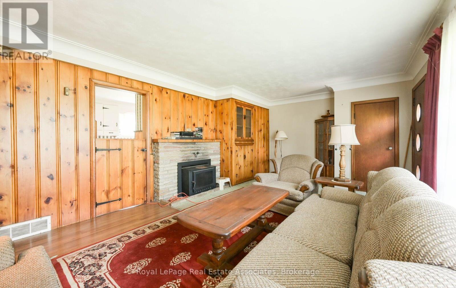 27 Rothsay Avenue, Kitchener, ON - Indoor Photo Showing Living Room With Fireplace