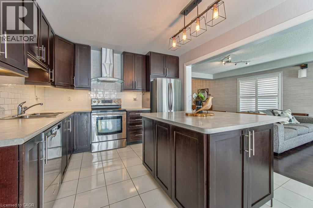 76 Ruhl Drive S, Milton, ON - Indoor Photo Showing Kitchen With Double Sink With Upgraded Kitchen