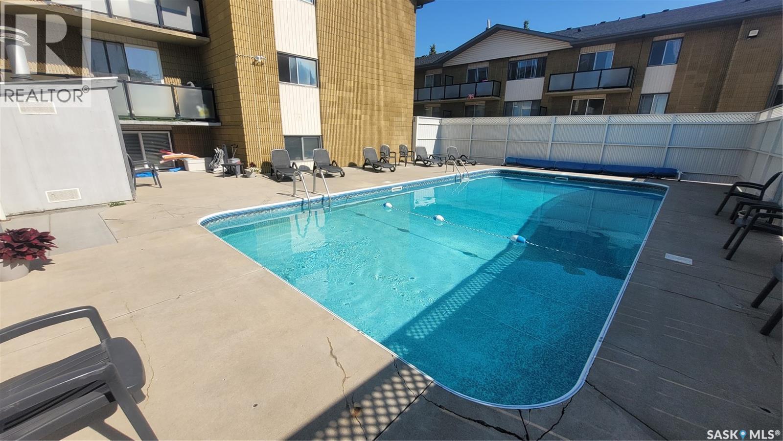 4 111 St Lawrence Crescent, Saskatoon, SK - Outdoor With In Ground Pool