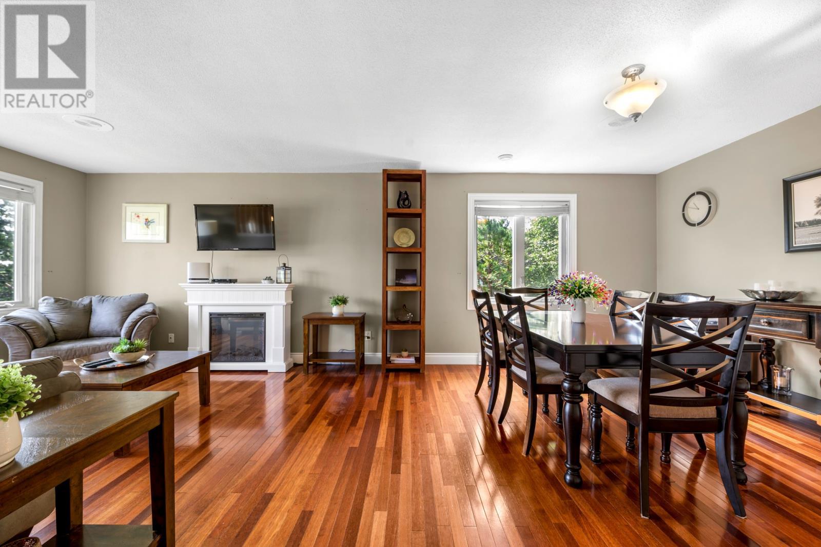 12 Riverview Place, Torbay, NL - Indoor Photo Showing Dining Room With Fireplace