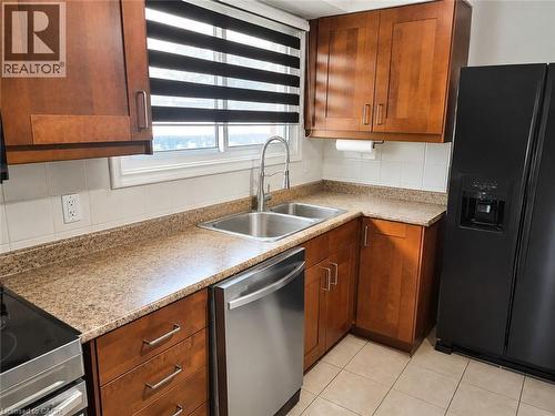 Virtually Staged - 144 Rendell Boulevard, Hamilton, ON - Indoor Photo Showing Kitchen With Double Sink