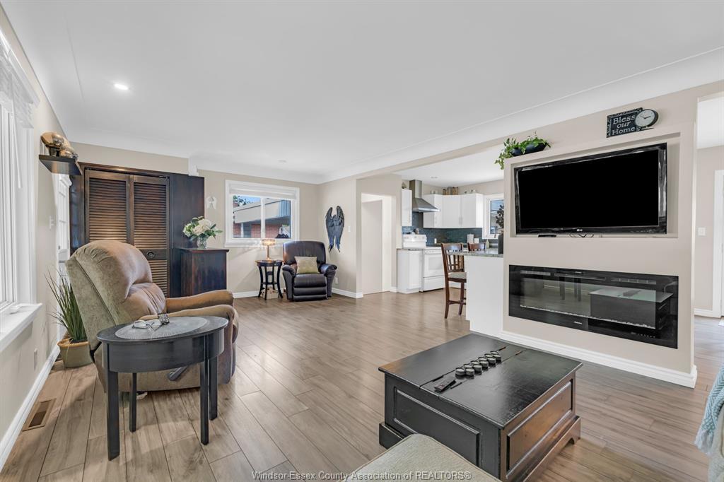 22 Danforth, Leamington, ON - Indoor Photo Showing Living Room With Fireplace
