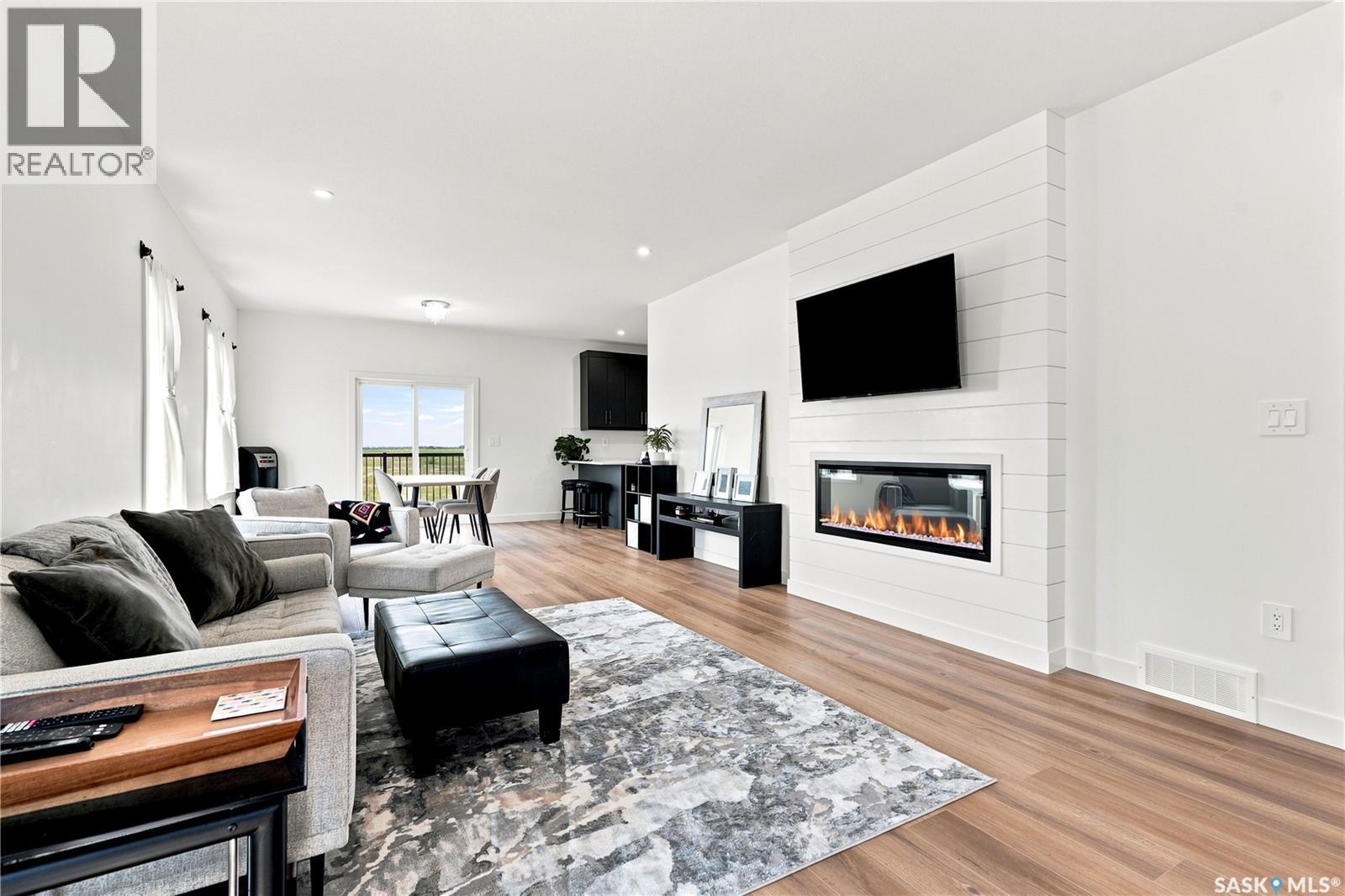 902 Bentley Manor, Saskatoon, SK - Indoor Photo Showing Living Room With Fireplace