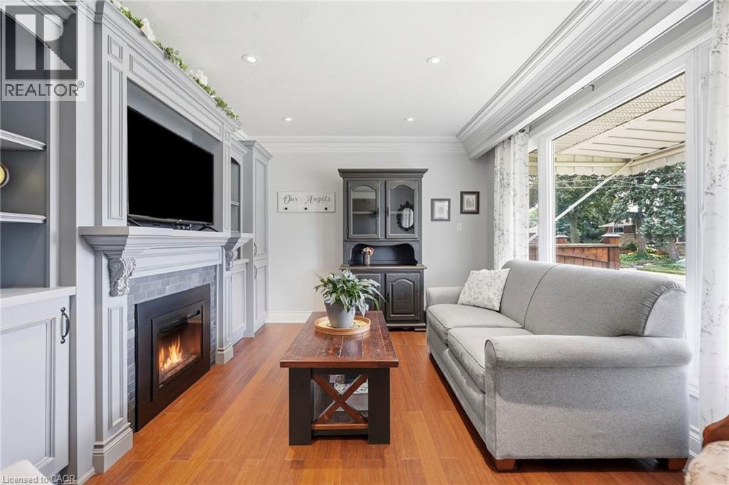 3 Mitchell Avenue, Hamilton, ON - Indoor Photo Showing Living Room With Fireplace