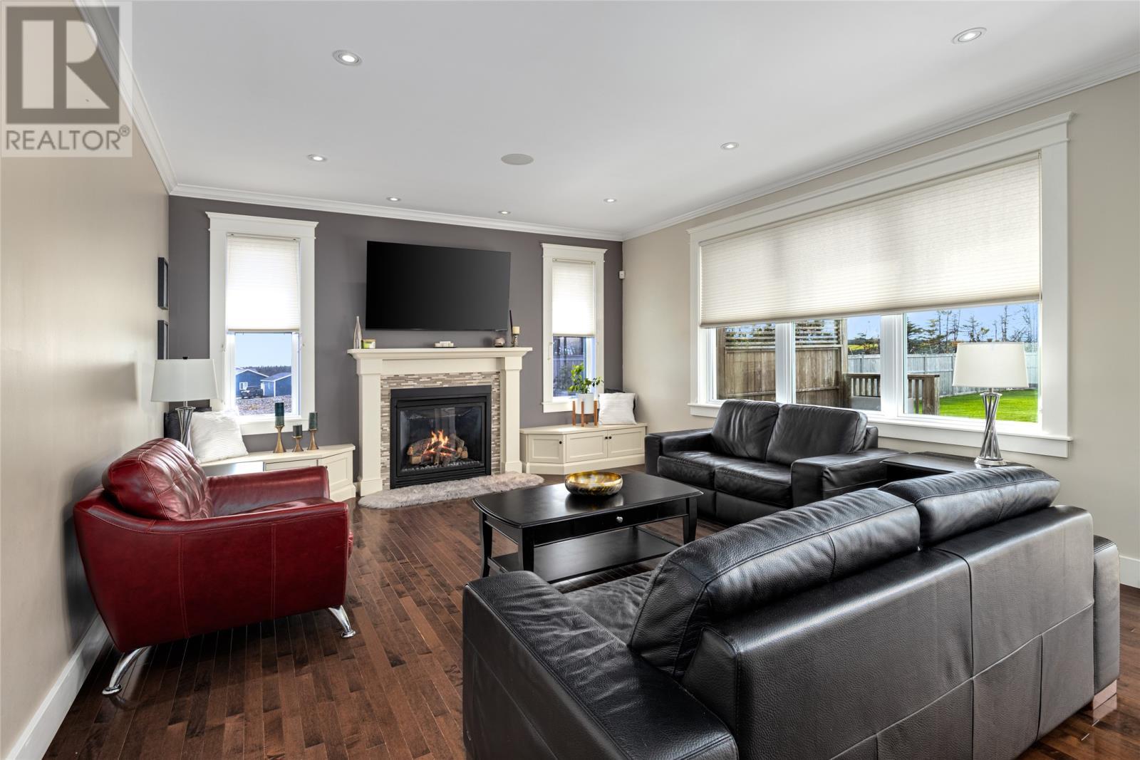 15 Flora Drive, Torbay, NL - Indoor Photo Showing Living Room With Fireplace