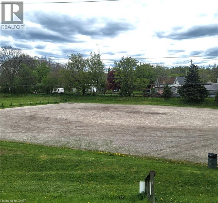 The soccer parking next door would make great visitor parking. - 46 Bridge Street E, Kitchener, ON