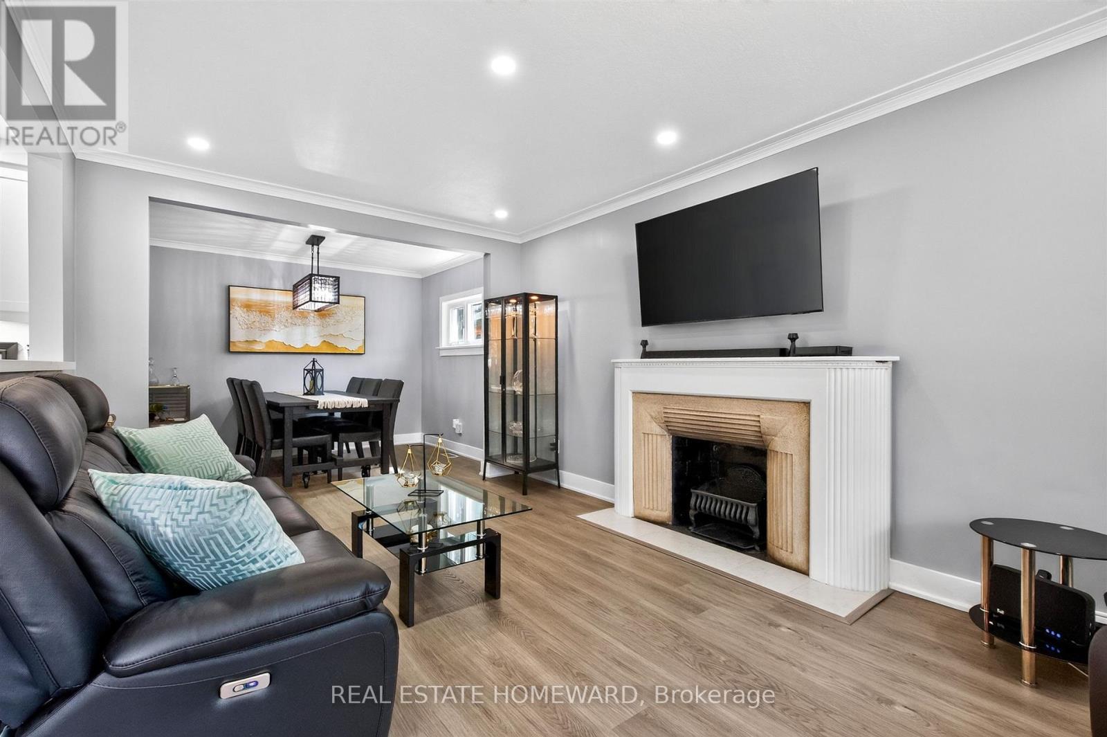 413 O'Connor Drive, Toronto, ON - Indoor Photo Showing Living Room With Fireplace