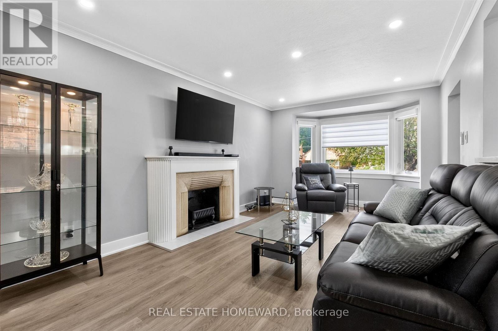 413 O'Connor Drive, Toronto, ON - Indoor Photo Showing Living Room With Fireplace