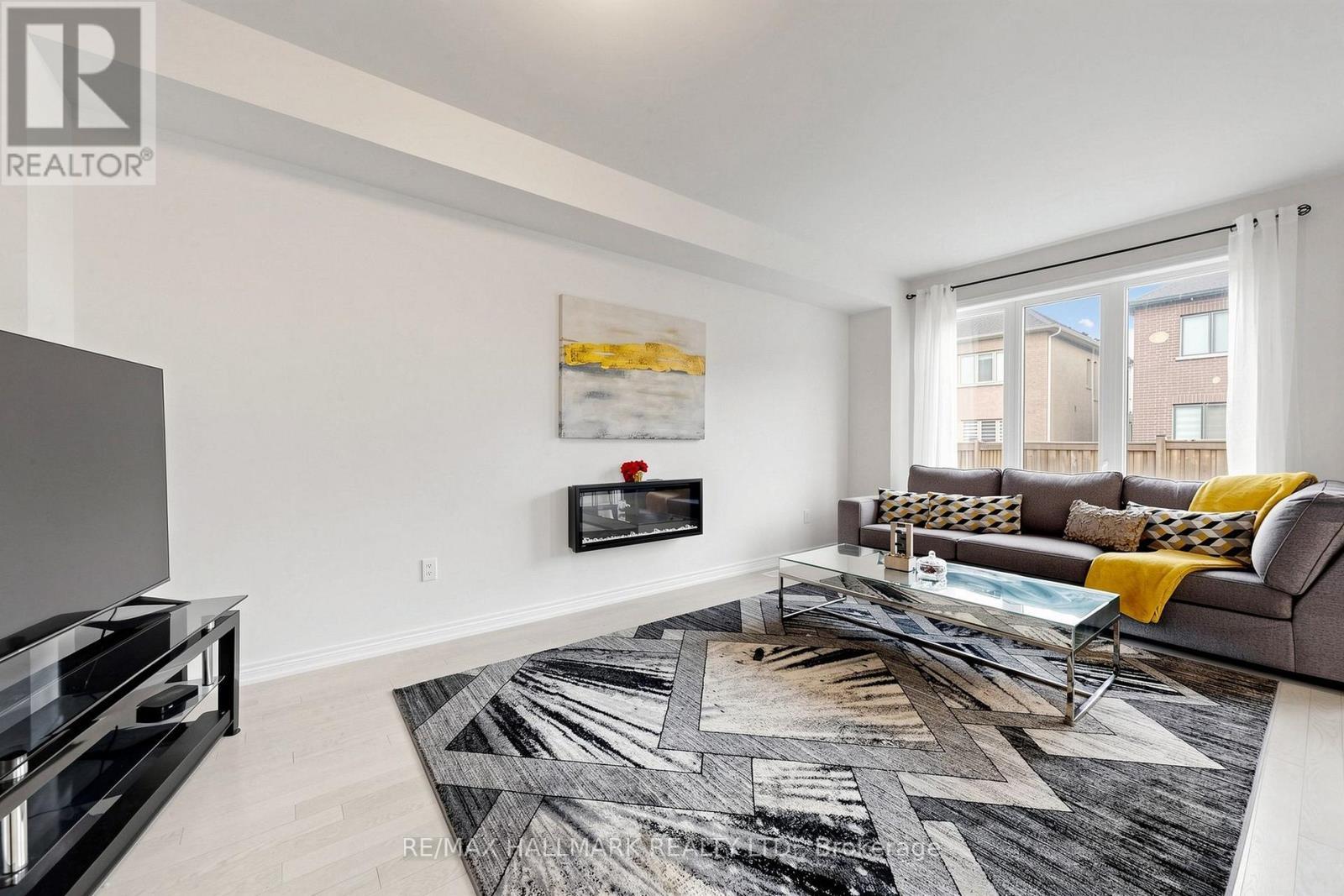 19 Conarty Crescent, Whitby, ON - Indoor Photo Showing Living Room With Fireplace