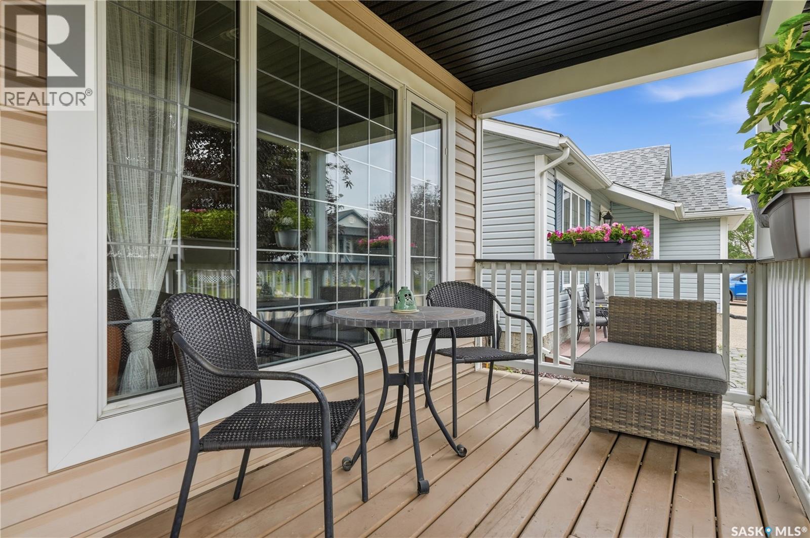 1030 Orchid Way N, Regina, SK - Outdoor With Deck Patio Veranda With Exterior