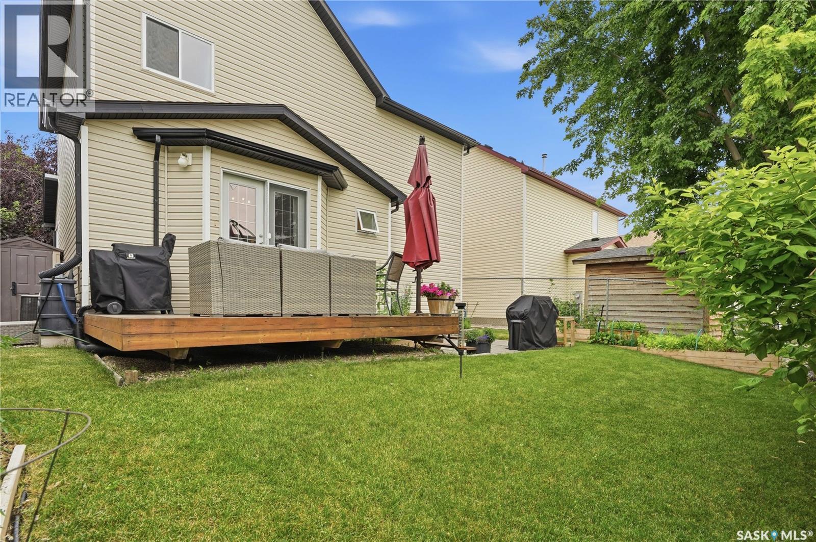1030 Orchid Way N, Regina, SK - Outdoor With Deck Patio Veranda With Exterior