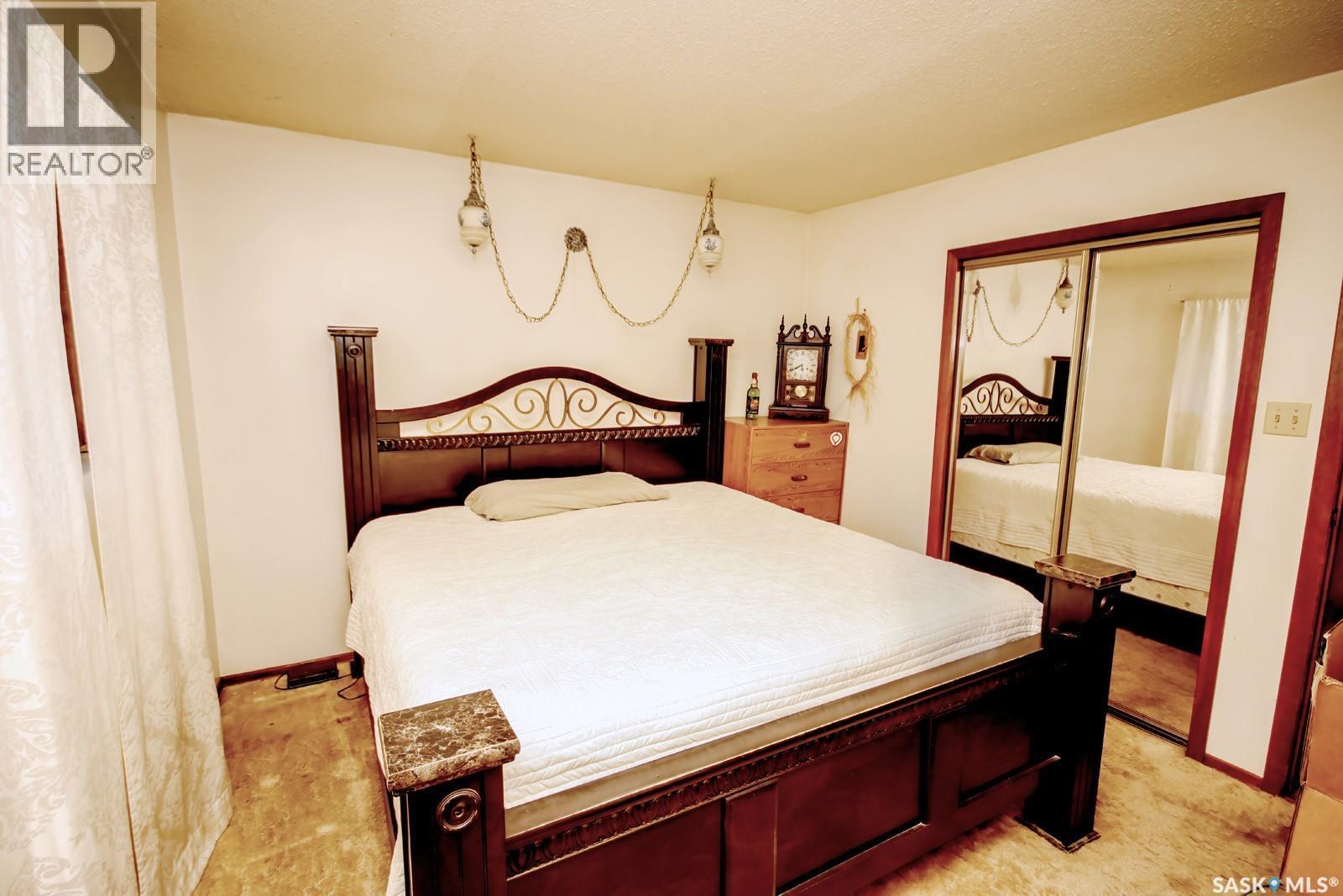 506 Garrish Place, Estevan, SK - Indoor Photo Showing Bedroom