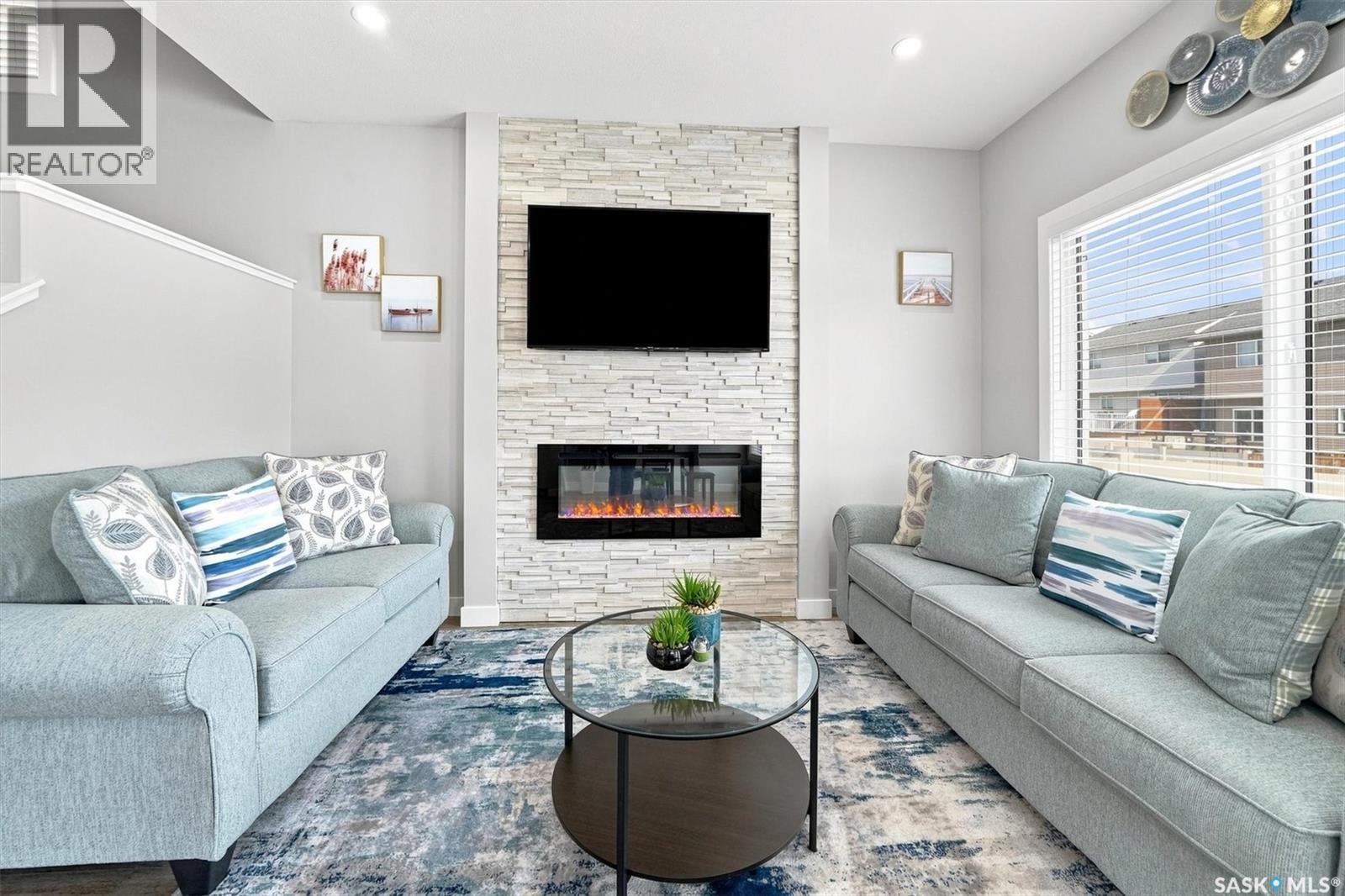 143 Barrett Street, Saskatoon, SK - Indoor Photo Showing Living Room With Fireplace