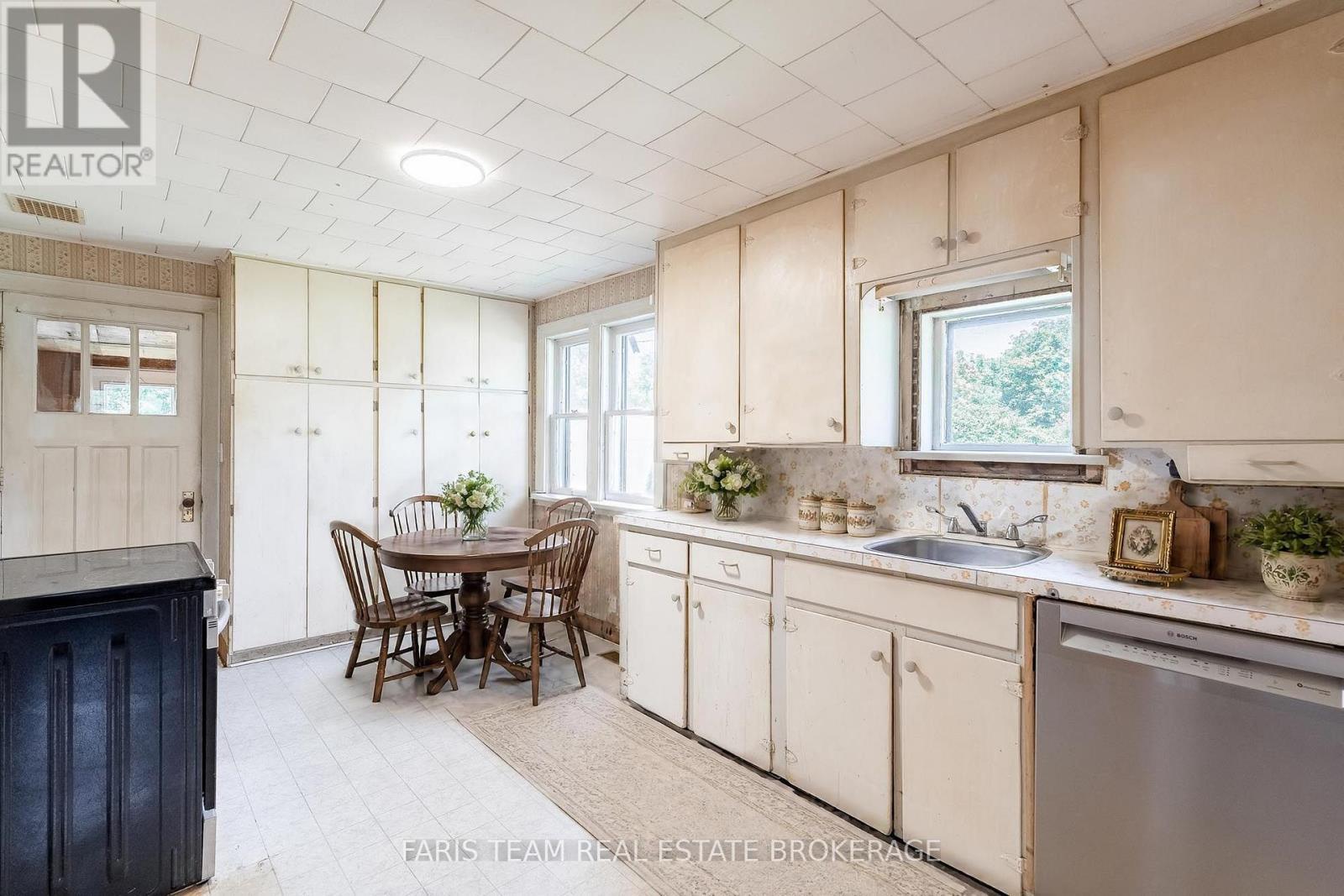Virtually Staged - 29 Marsh Lane, Tiny, ON - Indoor Photo Showing Kitchen