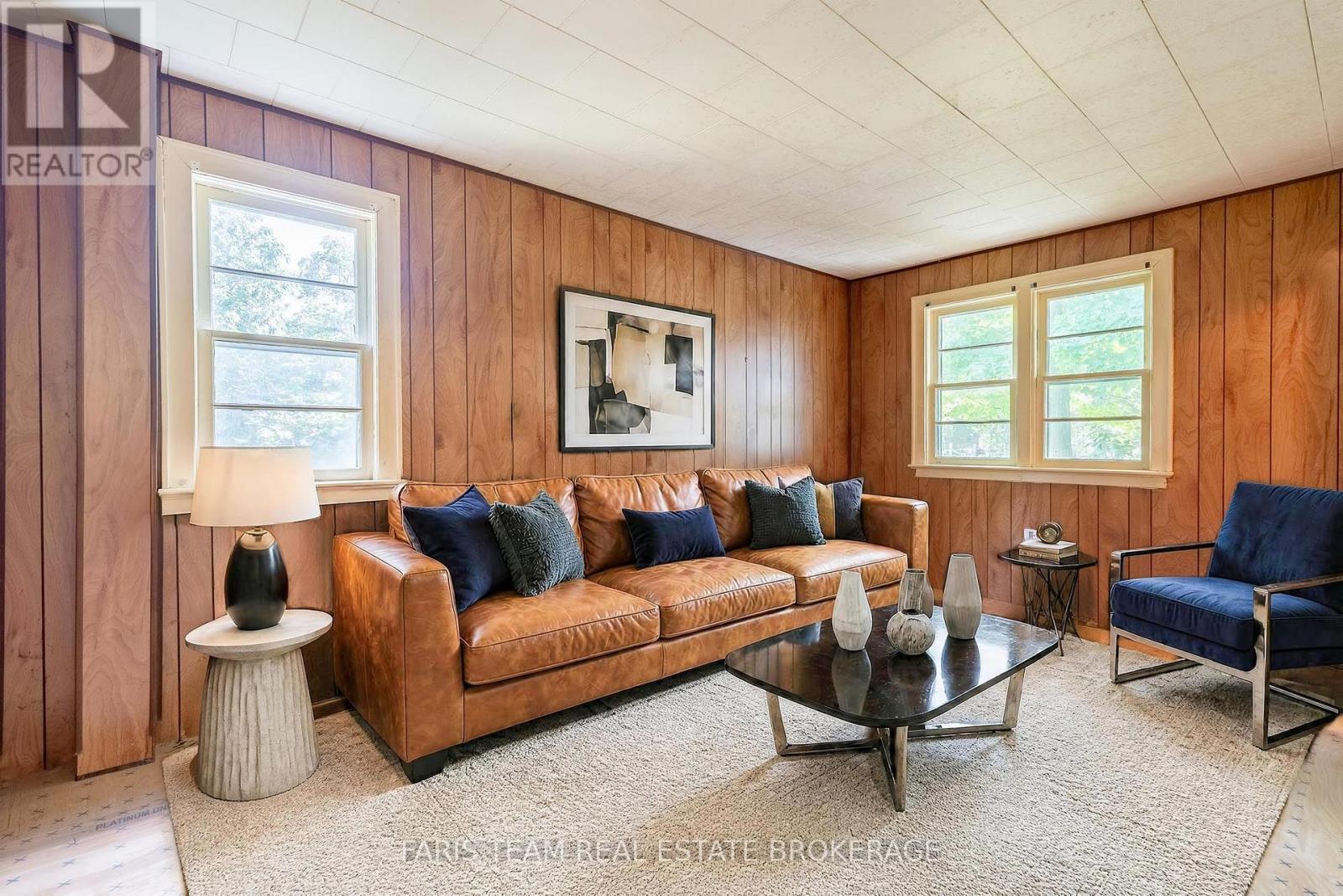 Virtually Staged - 29 Marsh Lane, Tiny, ON - Indoor Photo Showing Living Room