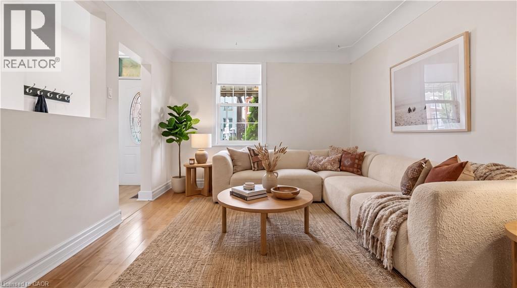 Virtually Staged - 180 West Avenue, Hamilton, ON - Indoor Photo Showing Living Room