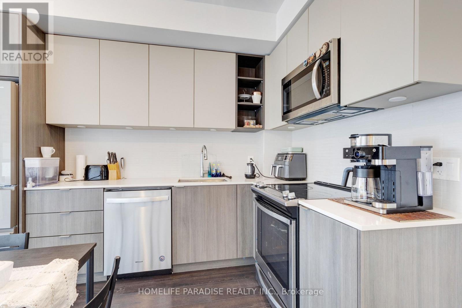 319 - 100 Eagle Rock Way, Vaughan, ON - Indoor Photo Showing Kitchen With Stainless Steel Kitchen