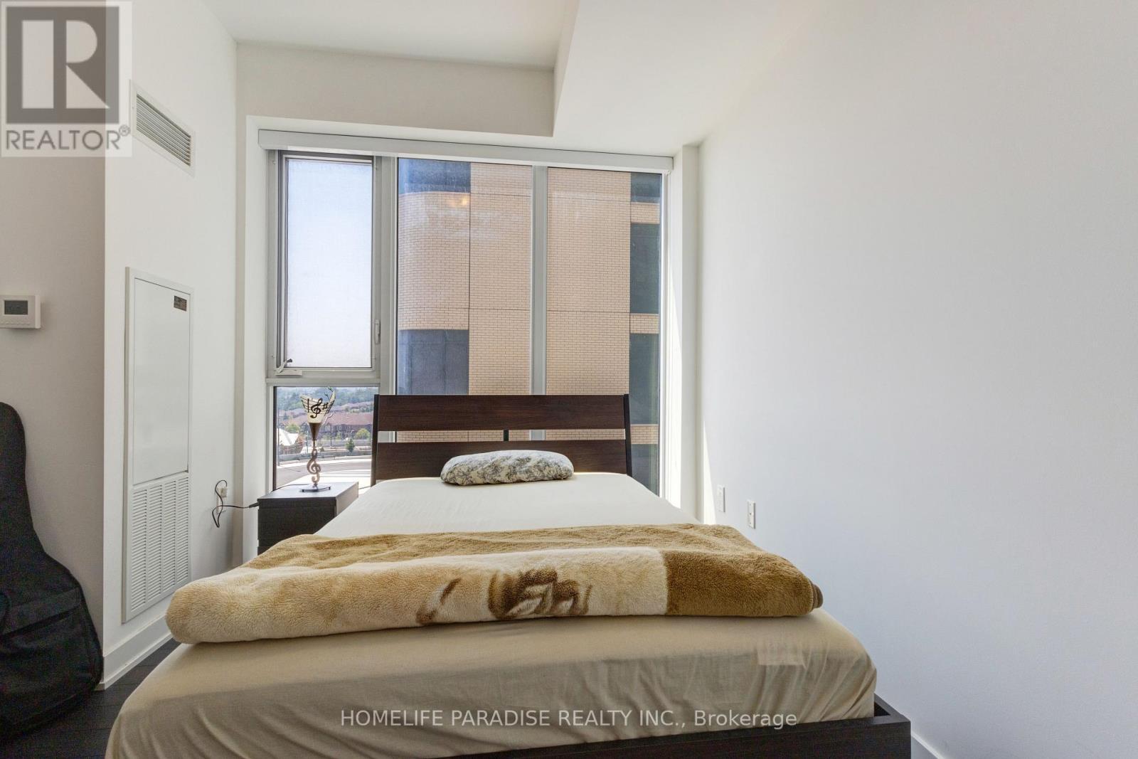 319 - 100 Eagle Rock Way, Vaughan, ON - Indoor Photo Showing Bedroom