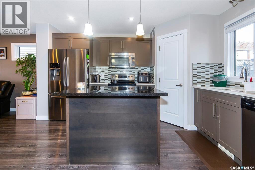 155 Marlatte Crescent, Saskatoon, SK - Indoor Photo Showing Kitchen With Double Sink With Upgraded Kitchen