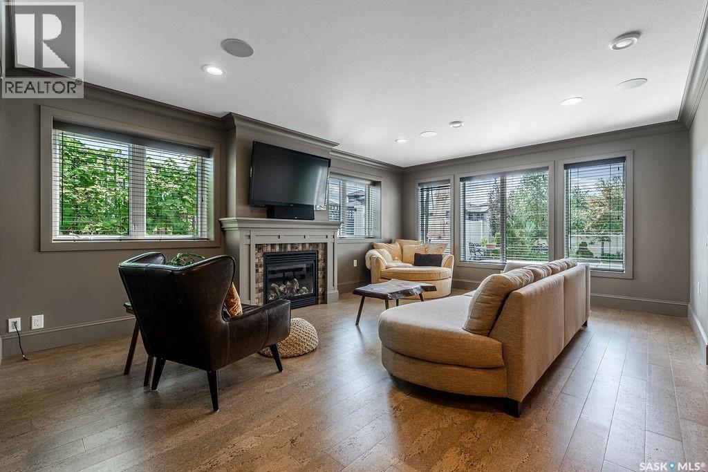 107 Mahabir Crescent, Saskatoon, SK - Indoor Photo Showing Living Room With Fireplace