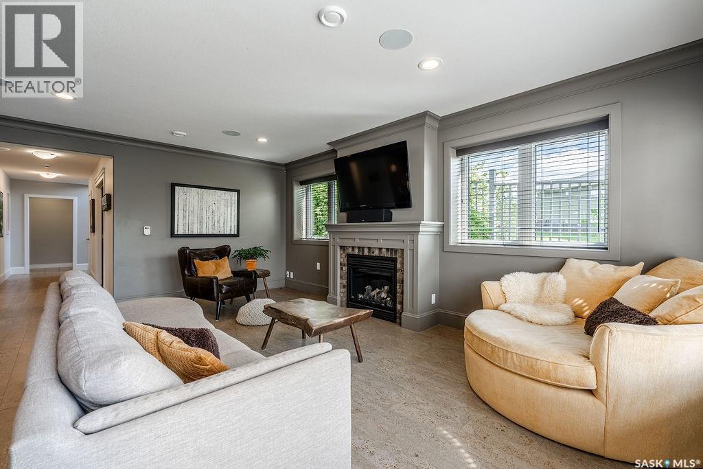 107 Mahabir Crescent, Saskatoon, SK - Indoor Photo Showing Living Room With Fireplace