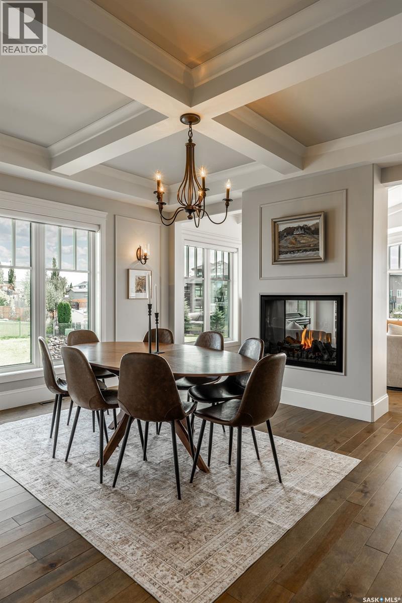 107 Mahabir Crescent, Saskatoon, SK - Indoor Photo Showing Dining Room With Fireplace