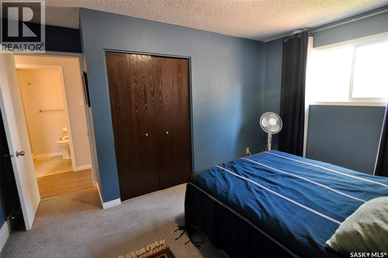 407 Wathaman Crescent, Saskatoon, SK - Indoor Photo Showing Bedroom