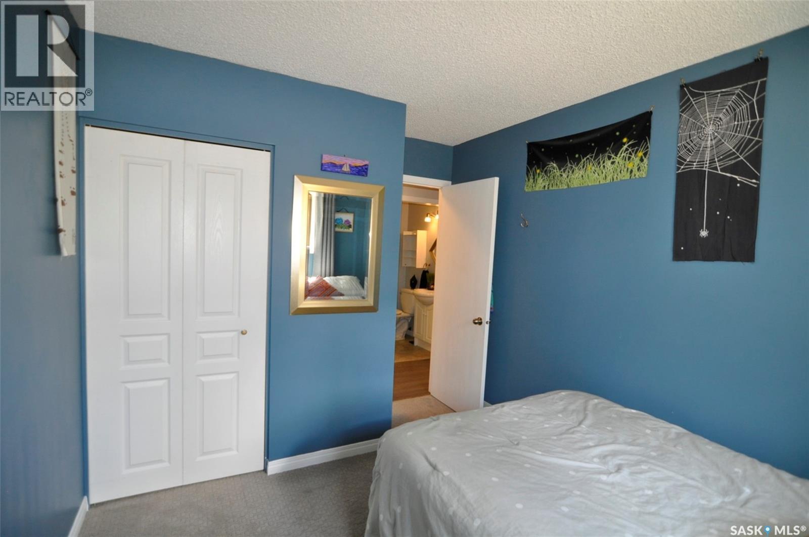 407 Wathaman Crescent, Saskatoon, SK - Indoor Photo Showing Bedroom