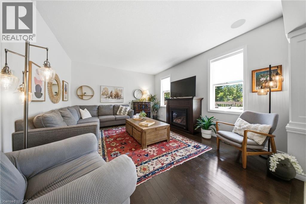 65 Amsterdam Crescent, Guelph, ON - Indoor Photo Showing Living Room With Fireplace