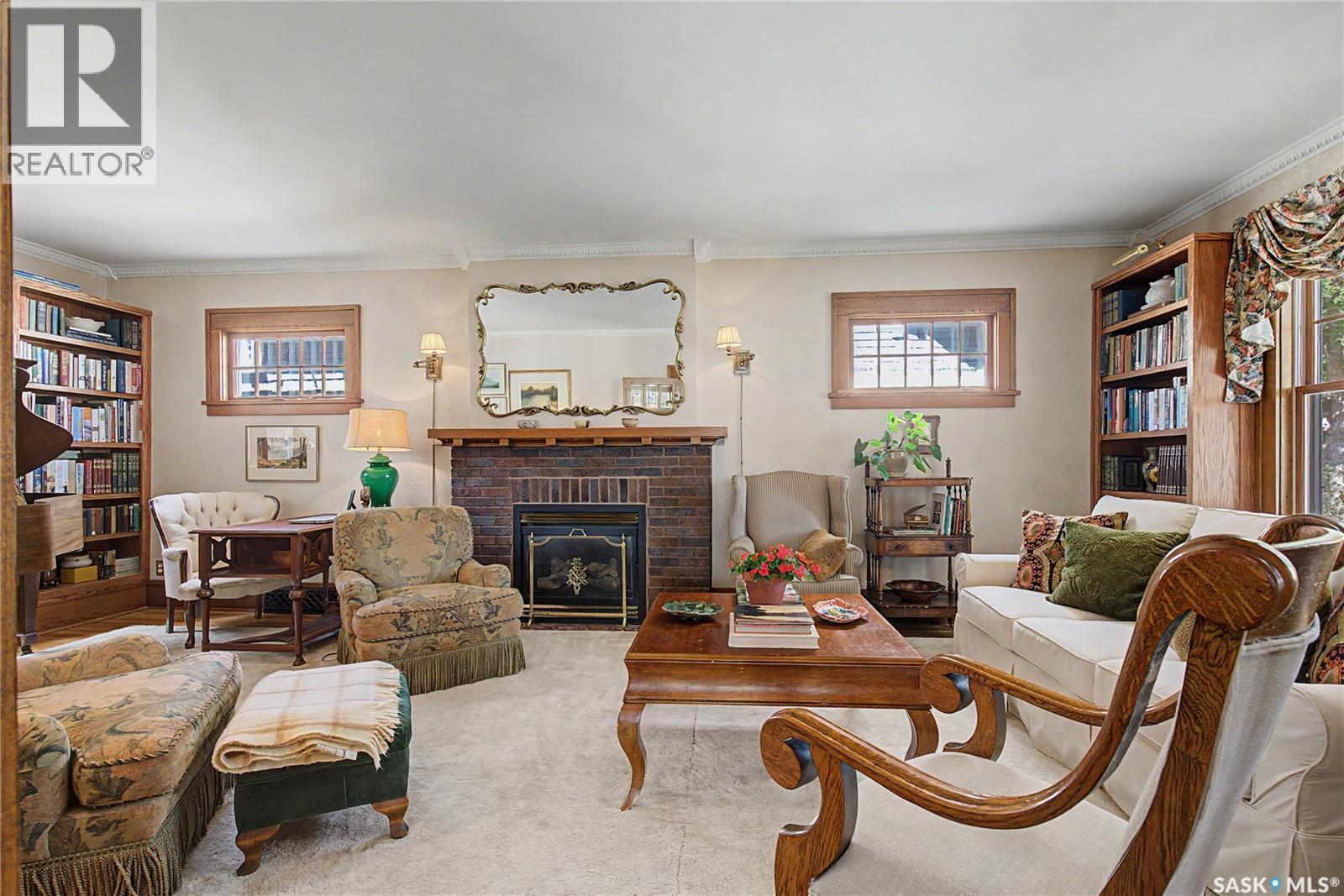 1150 2Nd Avenue Nw, Moose Jaw, SK - Indoor Photo Showing Living Room With Fireplace